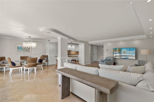 2301 Gulf Shore Blvd N Unit 114, Naples, FL 34103 - living area with ornamental molding, a chandelier, recessed lighting, and light tile patterned flooring