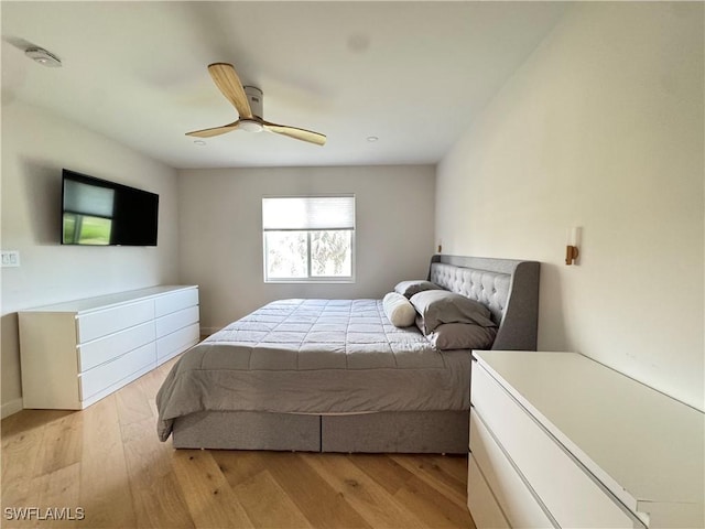 780 Augusta Blvd Unit C204, Naples, FL 34113 - bedroom with light wood-style flooring and a ceiling fan