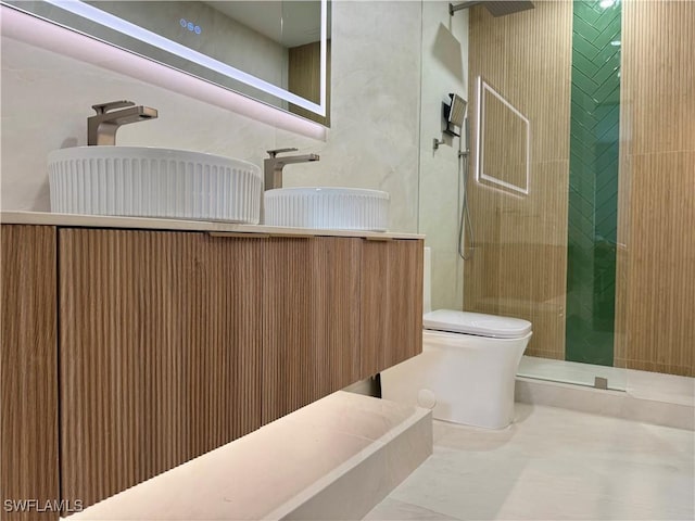 780 Augusta Blvd Unit C204, Naples, FL 34113 - full bathroom with toilet, tiled shower, and vanity