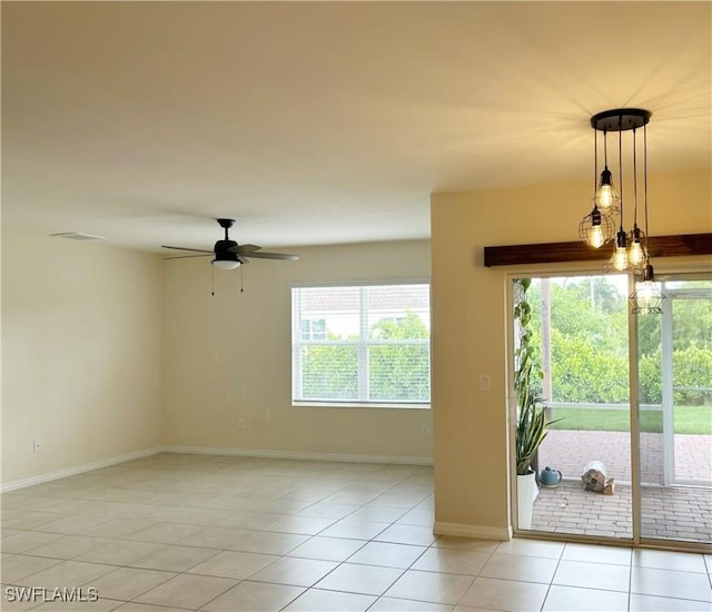 406 SW 25th Pl, Cape Coral, FL 33991 - spare room with light tile patterned flooring, baseboards, and ceiling fan