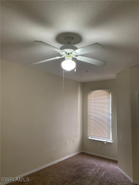 6169 Metrowest Blvd Unit 104, Orlando, FL 32835 - carpeted empty room featuring a textured ceiling, baseboards, and ceiling fan