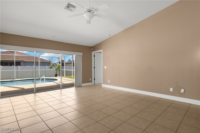 2933 NW 25th Ter, Cape Coral, FL 33993 - unfurnished room with vaulted ceiling, ceiling fan, and tile patterned flooring