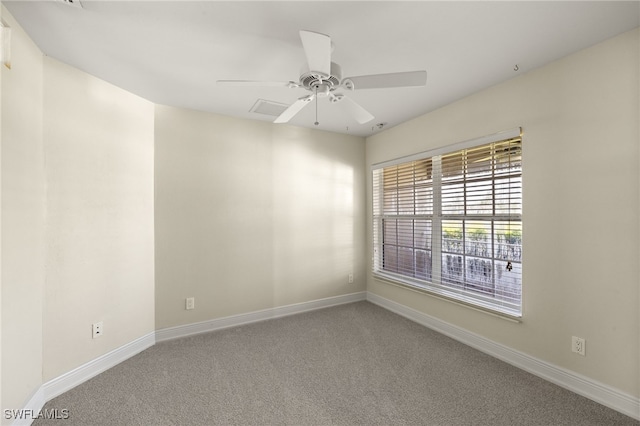 2933 NW 25th Ter, Cape Coral, FL 33993 - carpeted spare room featuring a ceiling fan and baseboards