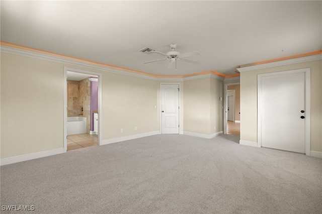 2933 NW 25th Ter, Cape Coral, FL 33993 - unfurnished bedroom with light carpet, ornamental molding, ensuite bath, and ceiling fan