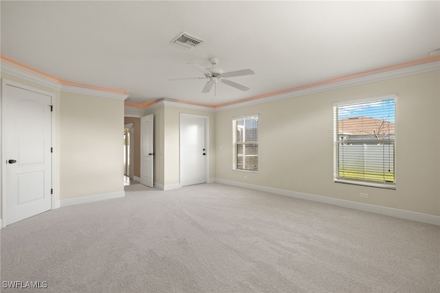 2933 NW 25th Ter, Cape Coral, FL 33993 - unfurnished bedroom with ornamental molding, light carpet, and ceiling fan