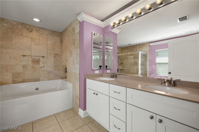 2933 NW 25th Ter, Cape Coral, FL 33993 - bathroom featuring a tile shower, double vanity, tile patterned floors, and a bathtub