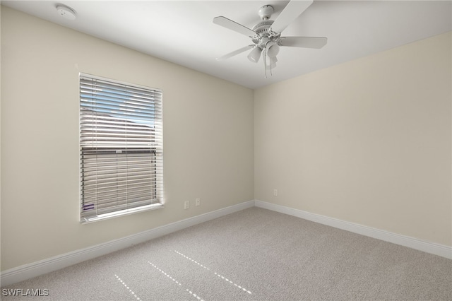 2933 NW 25th Ter, Cape Coral, FL 33993 - carpeted empty room with a smoke detector and ceiling fan
