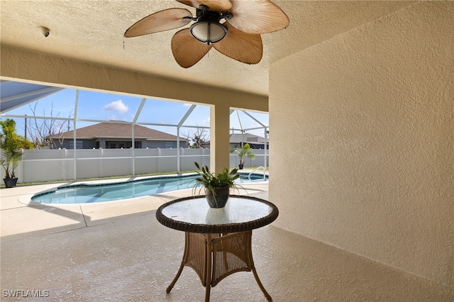 2933 NW 25th Ter, Cape Coral, FL 33993 - view of pool with a patio area, ceiling fan, and glass enclosure