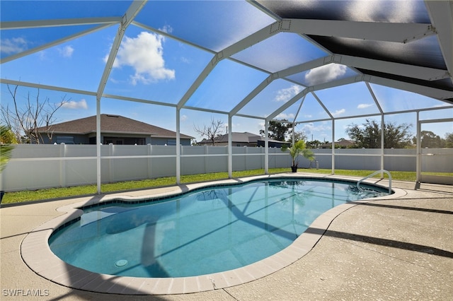 2933 NW 25th Ter, Cape Coral, FL 33993 - view of pool featuring a patio, a fenced backyard, and a lanai