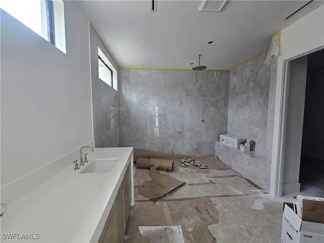 109 S Seas Ct, Marco Island, FL 34145 - full bathroom featuring a sink and a marble finish shower