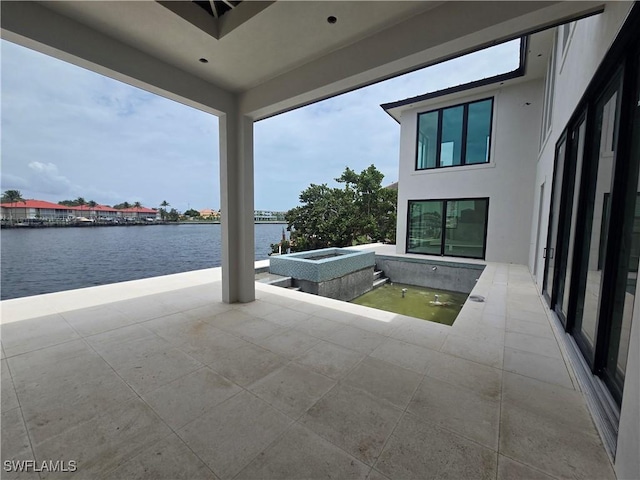 109 S Seas Ct, Marco Island, FL 34145 - view of patio featuring a water view and a pool with connected hot tub