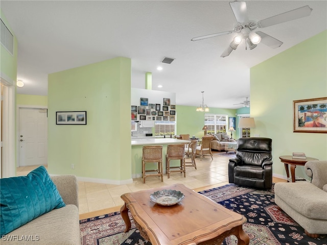 28979 Vermillion Ln, Bonita Springs, FL 34135 - living room featuring ceiling fan, light tile patterned floors, a chandelier, and recessed lighting