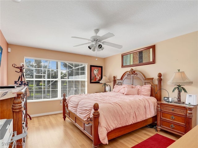 28979 Vermillion Ln, Bonita Springs, FL 34135 - bedroom featuring light wood-style floors and ceiling fan