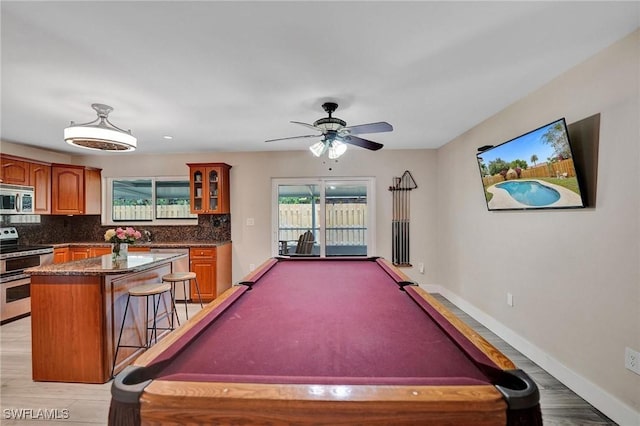 5530 SW 113th Ave, Cooper City, FL 33330 - rec room with billiards table, a ceiling fan, light wood-style floors, baseboards, and a baseboard radiator