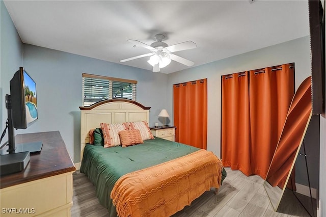5530 SW 113th Ave, Cooper City, FL 33330 - bedroom featuring a ceiling fan and light wood-style flooring