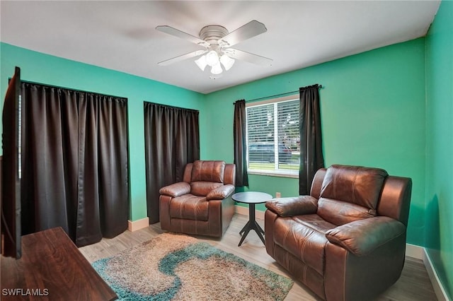 5530 SW 113th Ave, Cooper City, FL 33330 - sitting room featuring baseboards, a ceiling fan, and light wood-style floors