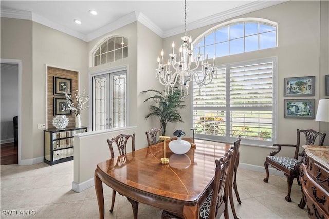 8423 Gleneagle Way, Naples, FL 34120 - dining space featuring healthy amount of natural light, crown molding, a chandelier, light tile patterned floors, and a high ceiling