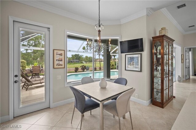 8423 Gleneagle Way, Naples, FL 34120 - dining area with crown molding, a chandelier, and light tile patterned floors