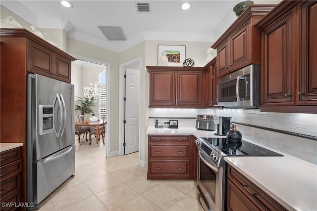 8423 Gleneagle Way, Naples, FL 34120 - kitchen featuring appliances with stainless steel finishes, light countertops, decorative backsplash, recessed lighting, and ornamental molding