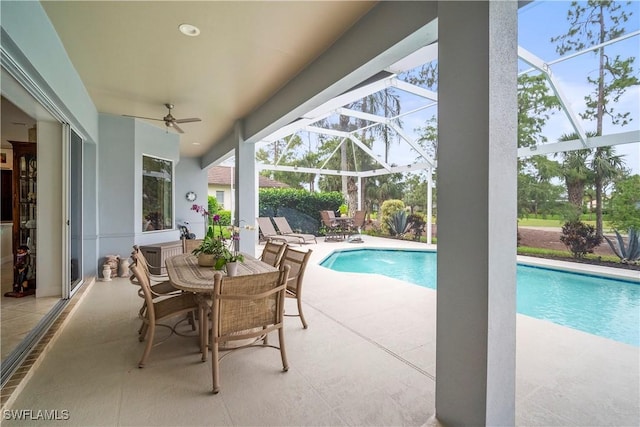 8423 Gleneagle Way, Naples, FL 34120 - swimming pool featuring a patio area, ceiling fan, outdoor dining space, and a lanai