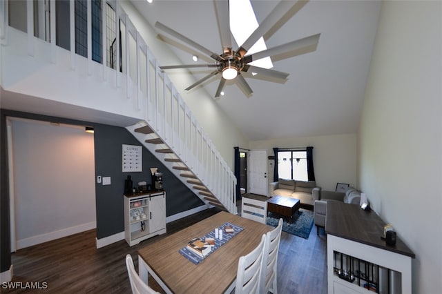 12964 Meadowood Ct, Fort Myers, FL 33919 - living area featuring high vaulted ceiling, stairs, wood finished floors, ceiling fan, and a bar