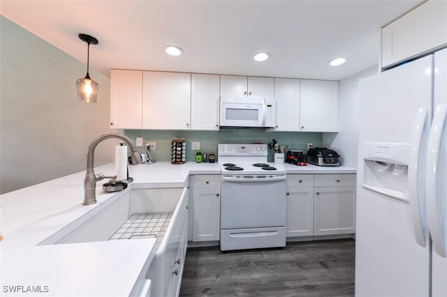 12964 Meadowood Ct, Fort Myers, FL 33919 - kitchen featuring white appliances, white cabinetry, tasteful backsplash, light countertops, and recessed lighting