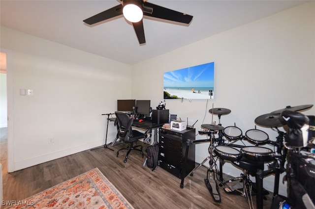 12964 Meadowood Ct, Fort Myers, FL 33919 - office area with wood finished floors, a ceiling fan, and baseboards