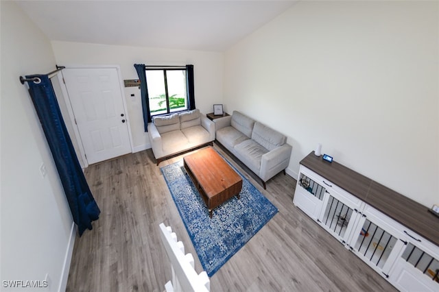 12964 Meadowood Ct, Fort Myers, FL 33919 - living room with wood finished floors and baseboards