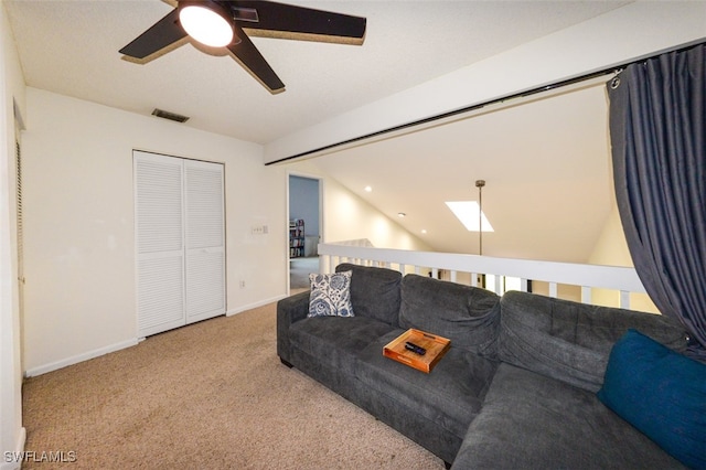 12964 Meadowood Ct, Fort Myers, FL 33919 - living area featuring ceiling fan, carpet, vaulted ceiling, and baseboards