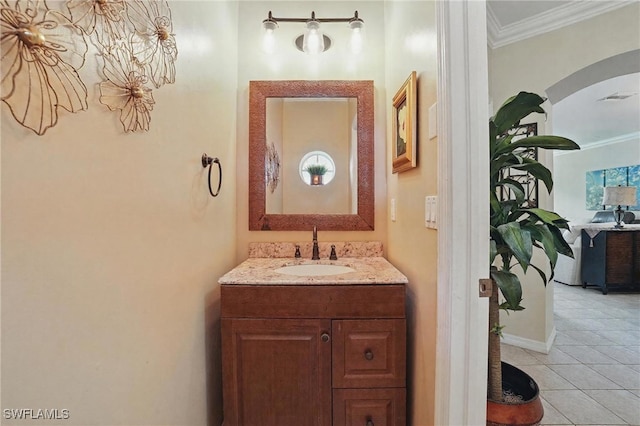 10020 Ravello Blvd, Fort Myers, FL 33905 - bathroom featuring vanity, crown molding, tile patterned flooring, and baseboards