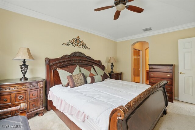 10020 Ravello Blvd, Fort Myers, FL 33905 - bedroom with light colored carpet, arched walkways, ornamental molding, and a ceiling fan