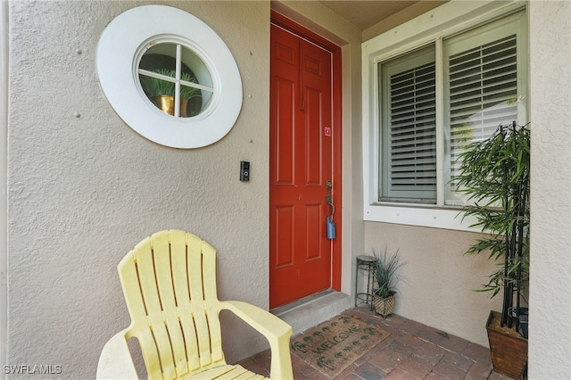 10020 Ravello Blvd, Fort Myers, FL 33905 - doorway to property featuring stucco siding