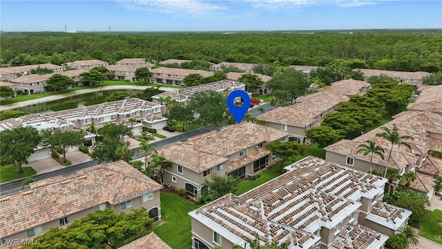 10020 Ravello Blvd, Fort Myers, FL 33905 - aerial perspective of suburban area featuring a heavily wooded area