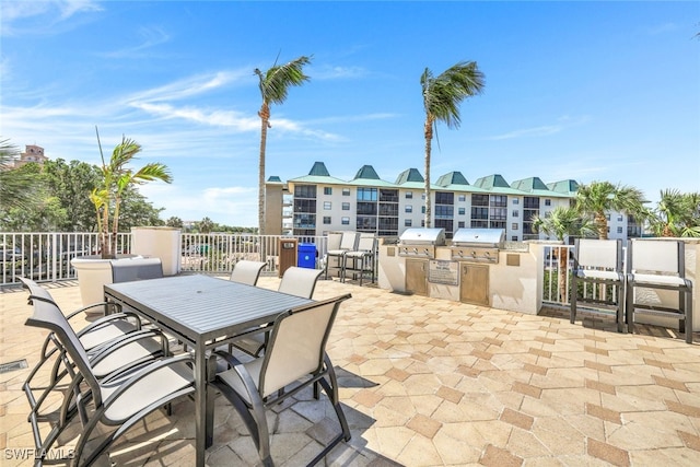 460 Launch Cir Ph 01, Naples, FL 34108 - view of patio / terrace featuring outdoor dining area