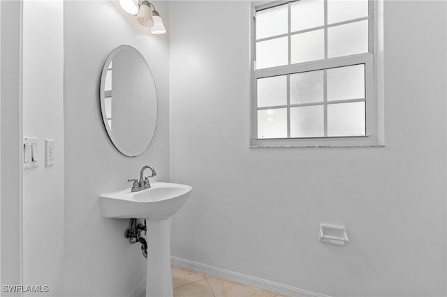 4381 Lazio Way Unit 501, Fort Myers, FL 33901 - bathroom featuring baseboards and tile patterned flooring