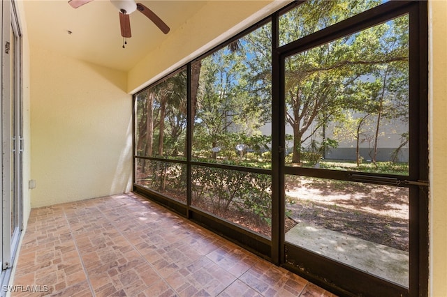 4381 Lazio Way Unit 501, Fort Myers, FL 33901 - unfurnished sunroom with a ceiling fan