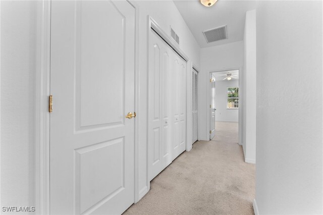 4381 Lazio Way Unit 501, Fort Myers, FL 33901 - hall featuring light carpet and baseboards
