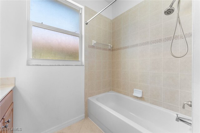 4381 Lazio Way Unit 501, Fort Myers, FL 33901 - full bathroom with vanity, shower / washtub combination, tile patterned flooring, and baseboards