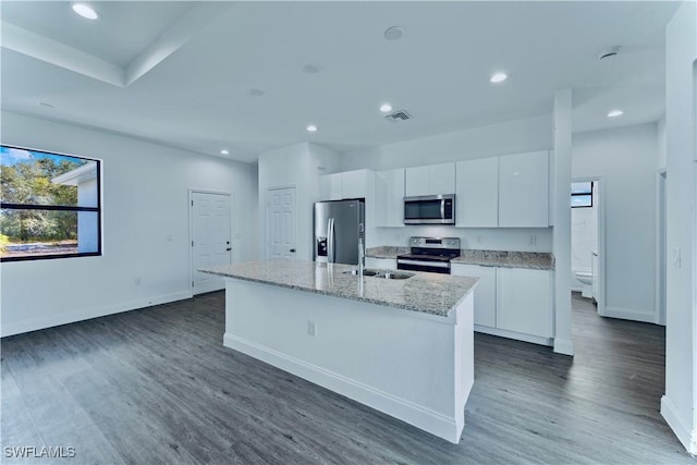 352 Rawlings Ave, Lehigh Acres, FL 33974 - kitchen featuring stainless steel appliances, white cabinetry, a sink, an island with sink, and recessed lighting