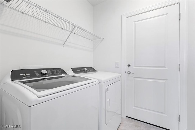 15828 Northridge Rd, Punta Gorda, FL 33982 - laundry room with washing machine and clothes dryer