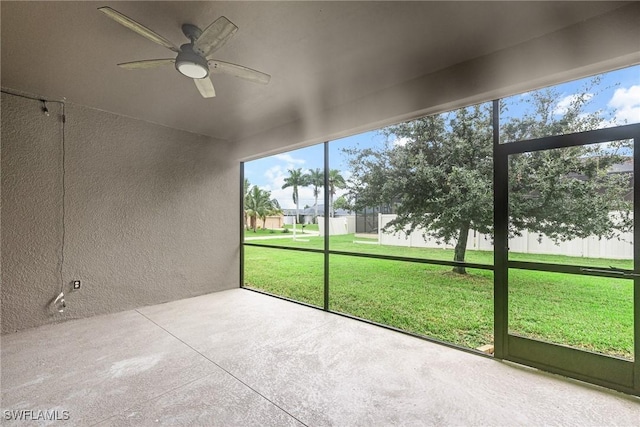 2211 SW 12th Ln, Cape Coral, FL 33991 - unfurnished sunroom featuring a ceiling fan