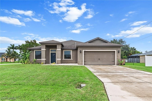2211 SW 12th Ln, Cape Coral, FL 33991 - view of front of house with stucco siding, concrete driveway, and a front yard