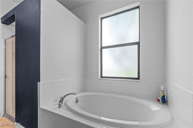 2211 SW 12th Ln, Cape Coral, FL 33991 - bathroom featuring a garden tub and a stall shower