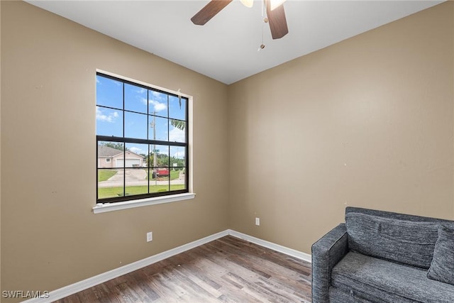 2211 SW 12th Ln, Cape Coral, FL 33991 - unfurnished room with wood finished floors and ceiling fan
