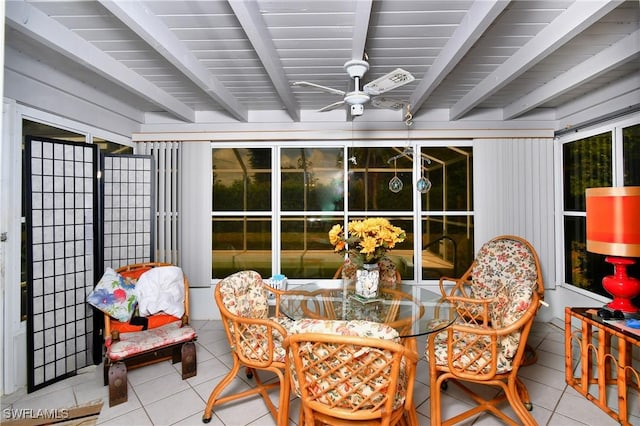 104 Waterview Ave, Lehigh Acres, FL 33936 - sunroom featuring a ceiling fan, beamed ceiling, and outdoor dining space
