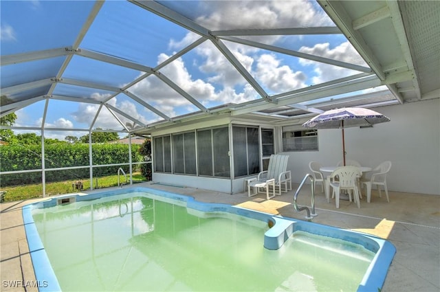 104 Waterview Ave, Lehigh Acres, FL 33936 - outdoor pool with a sunroom and a patio