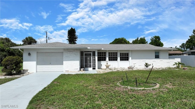 104 Waterview Ave, Lehigh Acres, FL 33936 - ranch-style house with a garage, driveway, stone siding, and stucco siding