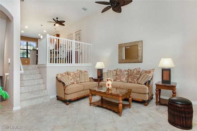9065 Albion Ln N Unit 4909, Naples, FL 34113 - living room with ceiling fan, arched walkways, recessed lighting, and a high ceiling
