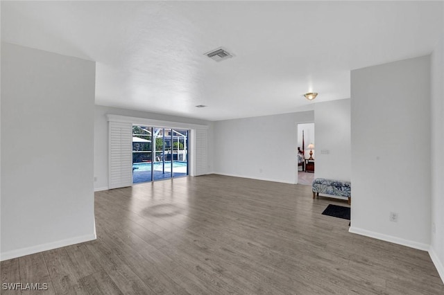 53 Madagascar Ct, Marco Island, FL 34145 - empty room with wood finished floors