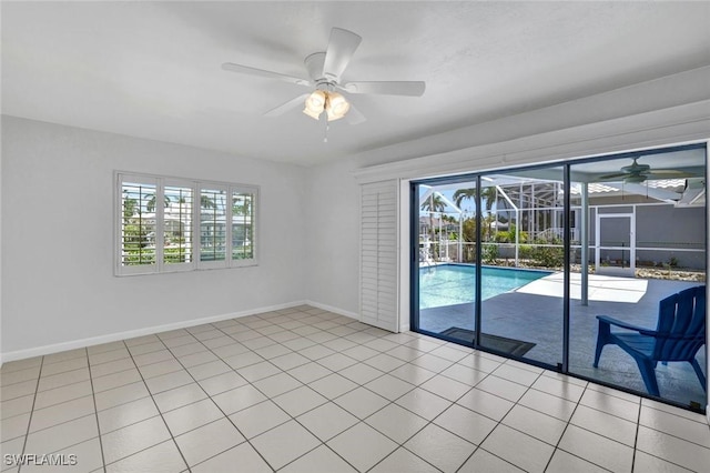 53 Madagascar Ct, Marco Island, FL 34145 - empty room featuring ceiling fan and a sunroom